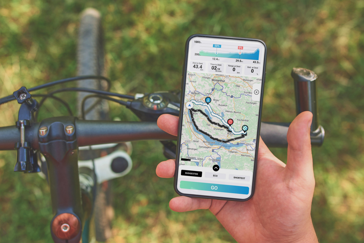 Man trains on bike with smartphone